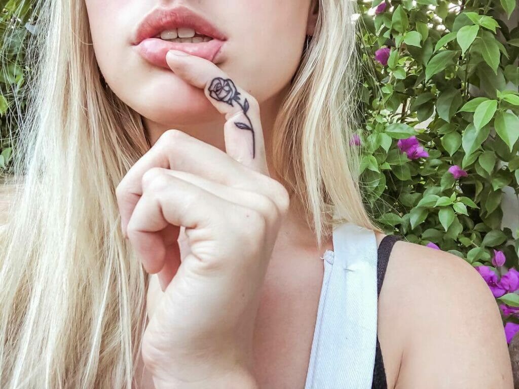 Spectacular And Mind-blowing Rose Finger Tattoo