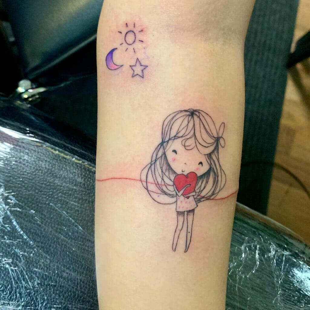 Girl Holding A Red Heart Tattoo