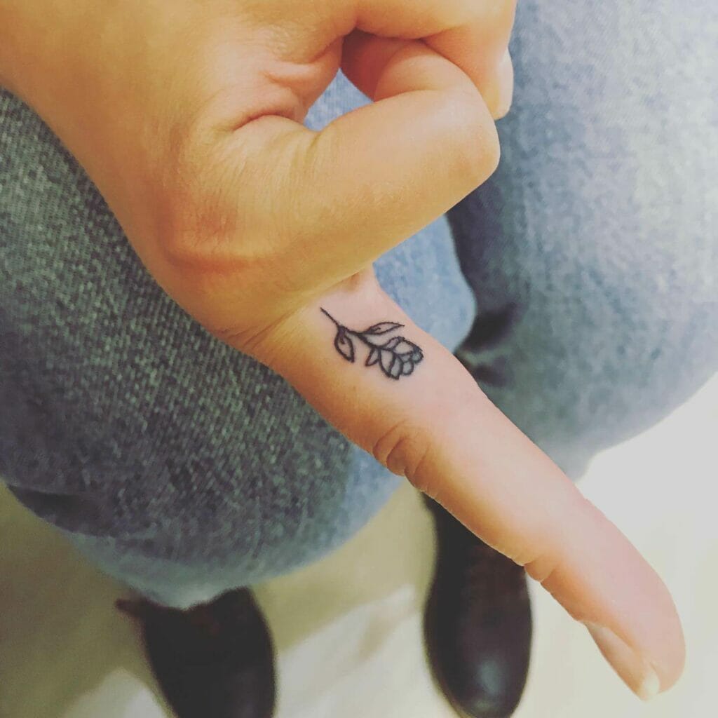Minimal Rose Tattoo On The Finger