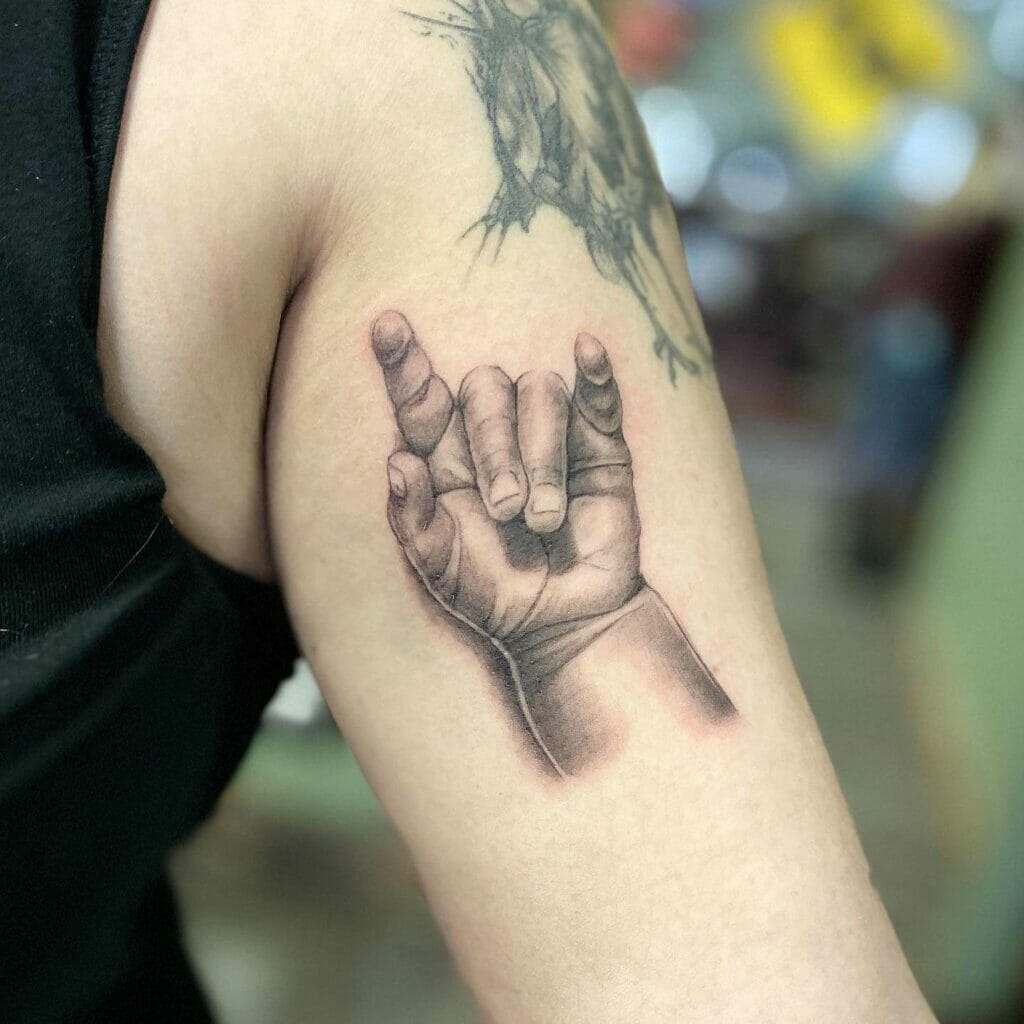 Hyper-realistic Baby Hand I Love You Ink