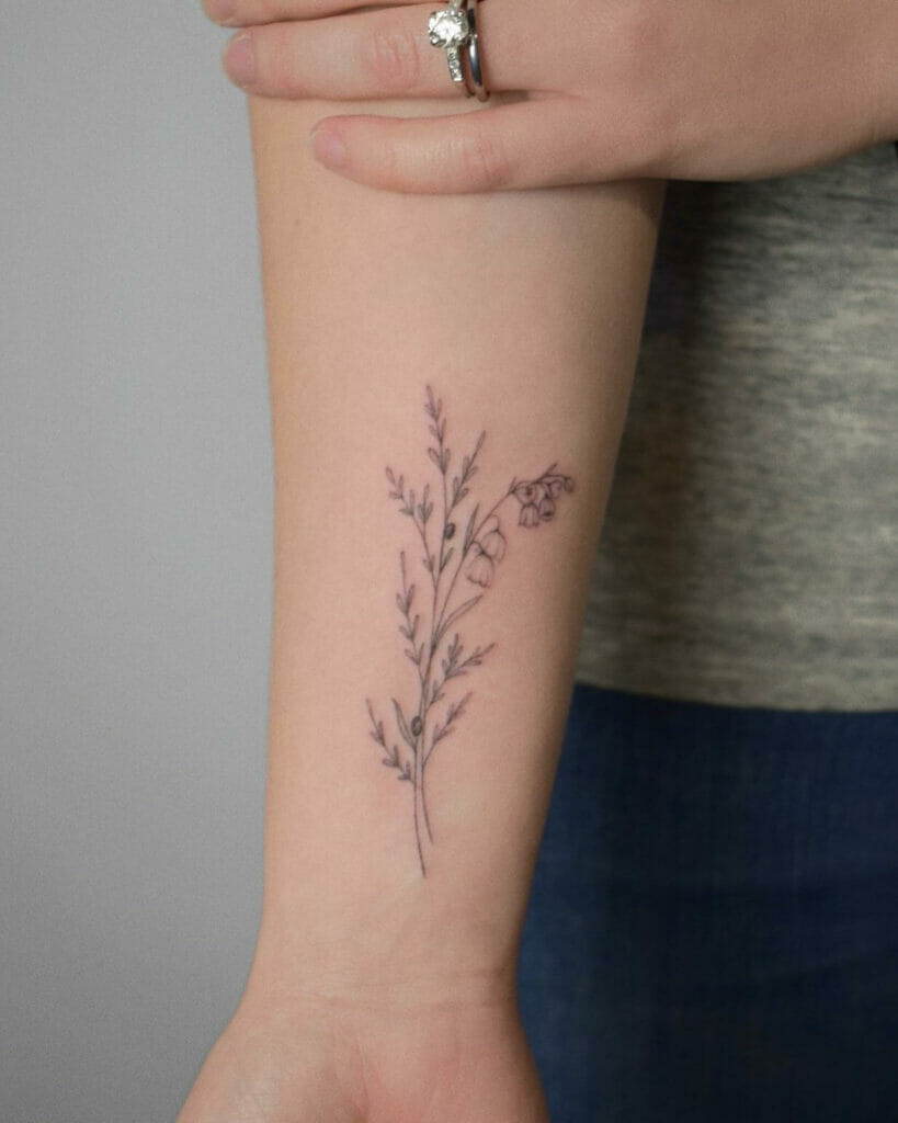 Pink Lily Flower Tattoo On Wrist