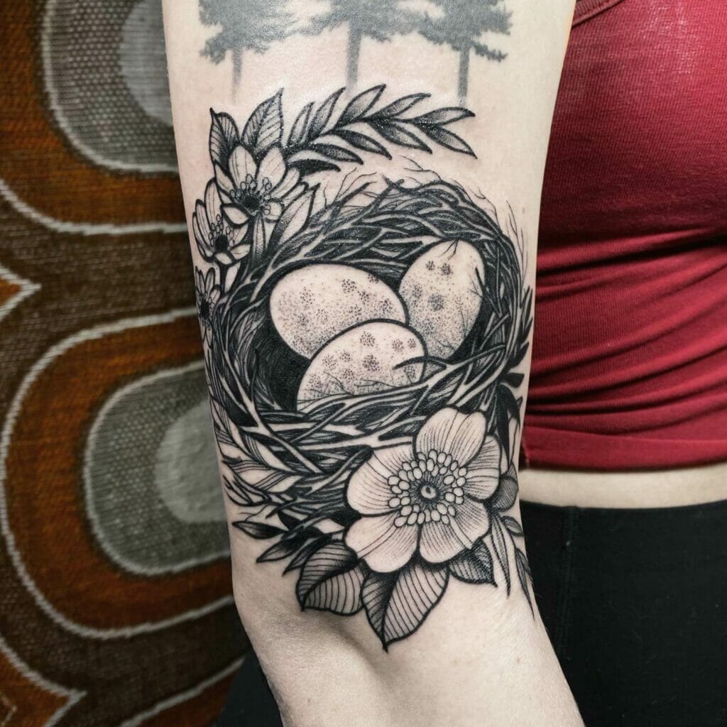 Crow Nest With Flowers Tattoo