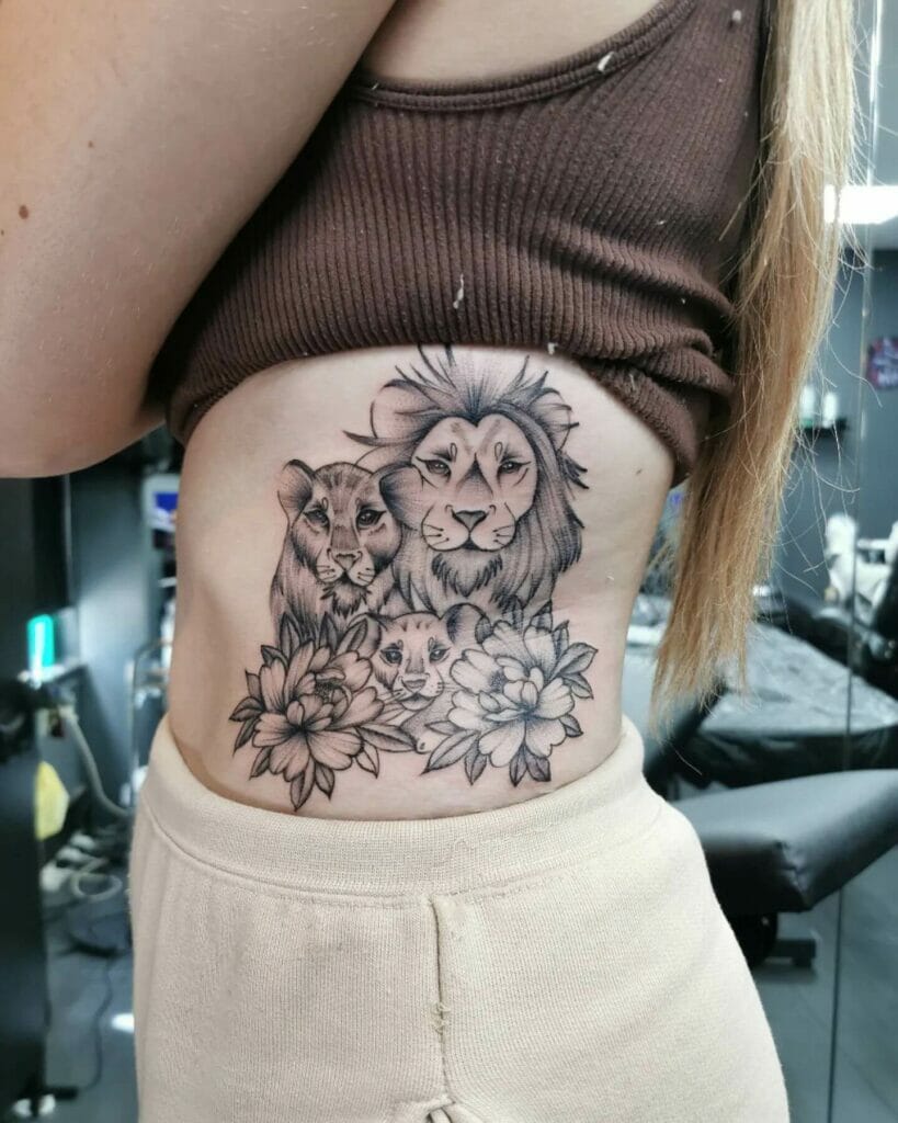Lion With Flowers Tattoo