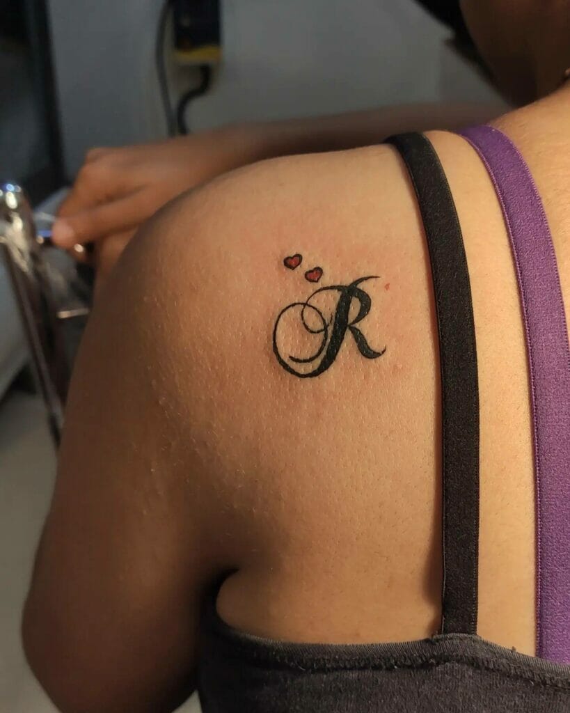 R Tattoo With Red Hearts