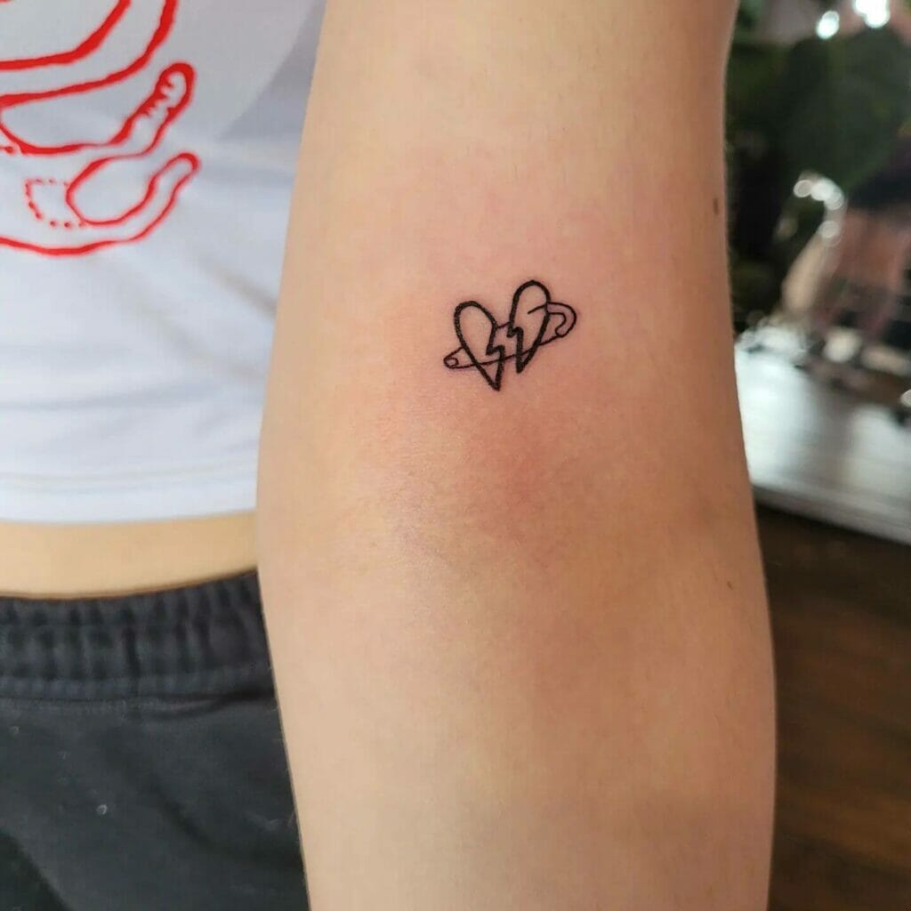 Broken Heart Tattoo With Safety Pin