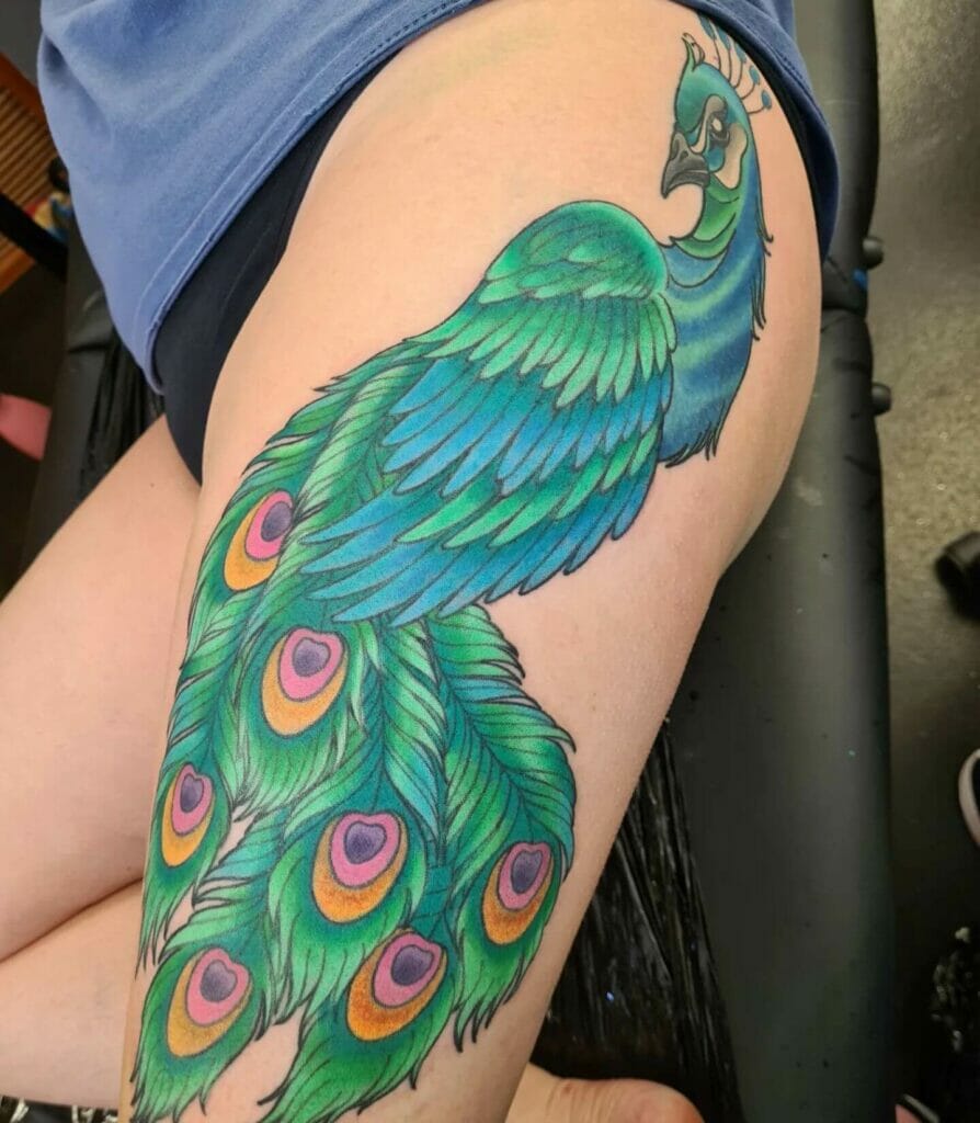 Beautiful Peacock Tattoo On Thigh