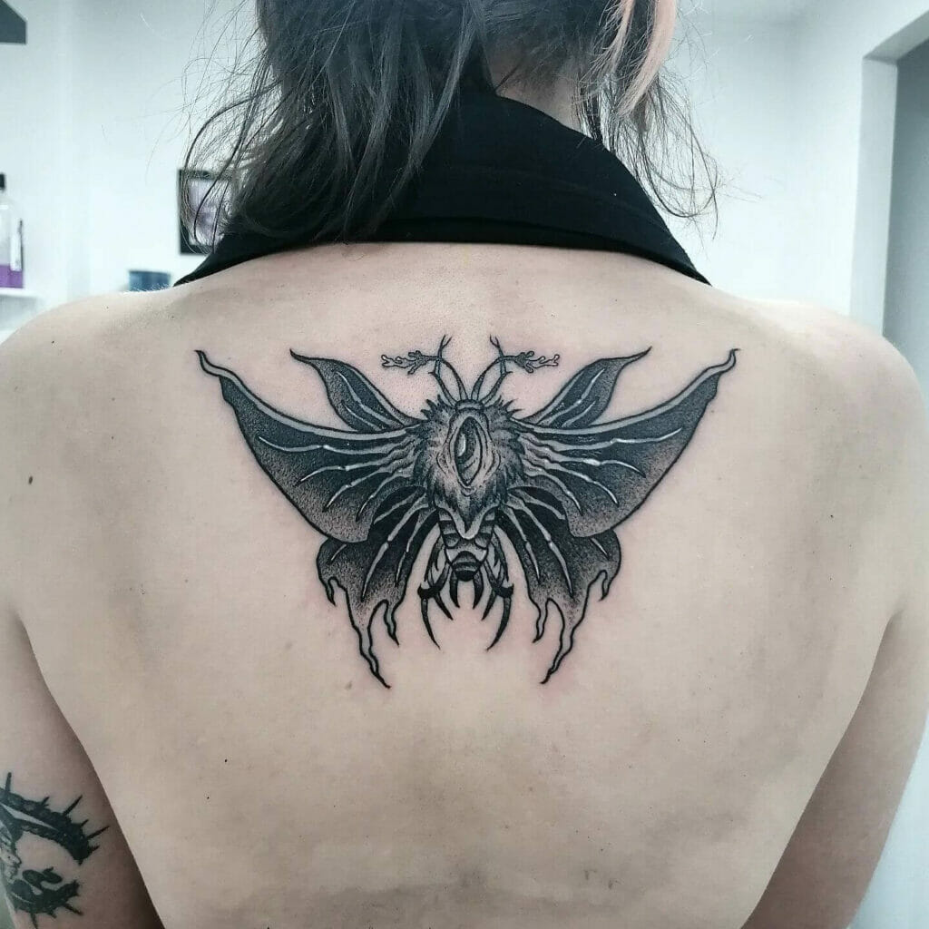 Evil Butterfly Tattoo Down Spine