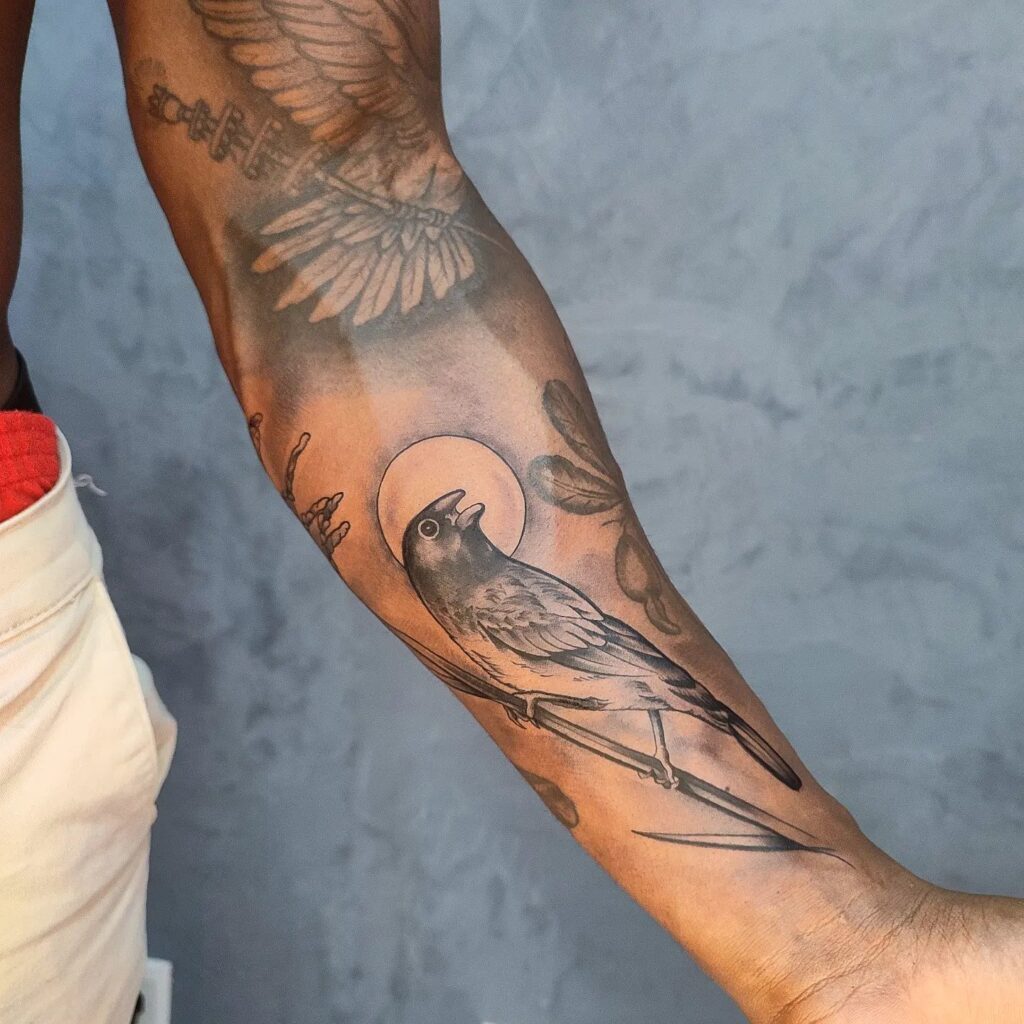 Bird Forearm Tattoo