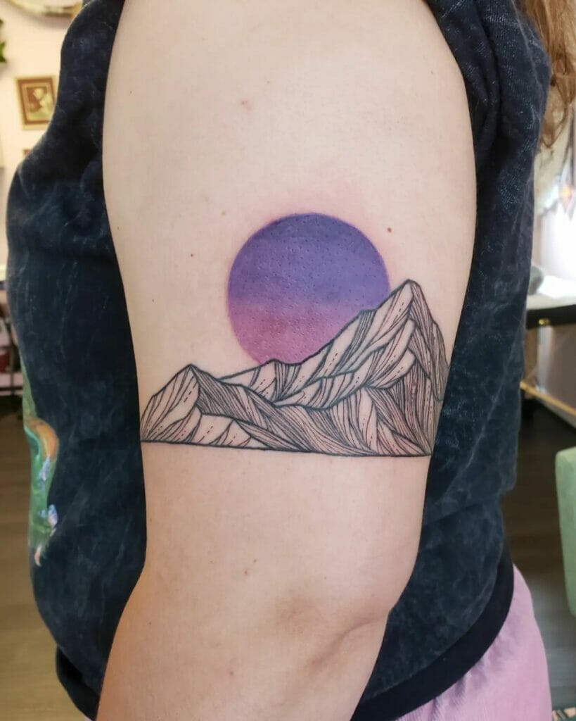 Arm Band Mountain Tattoo Featuring Purple Sun