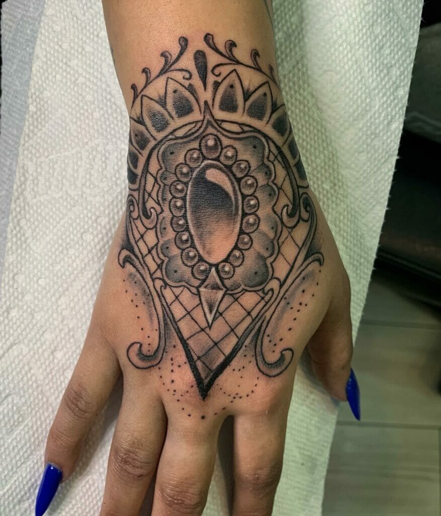 Black And Grey Mandala Gem Hand Tattoo Design