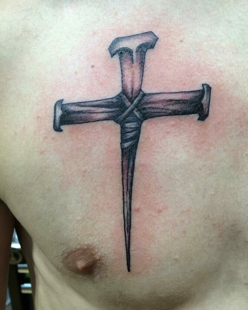 Chest Faithful Nail Cross Tattoo Idea