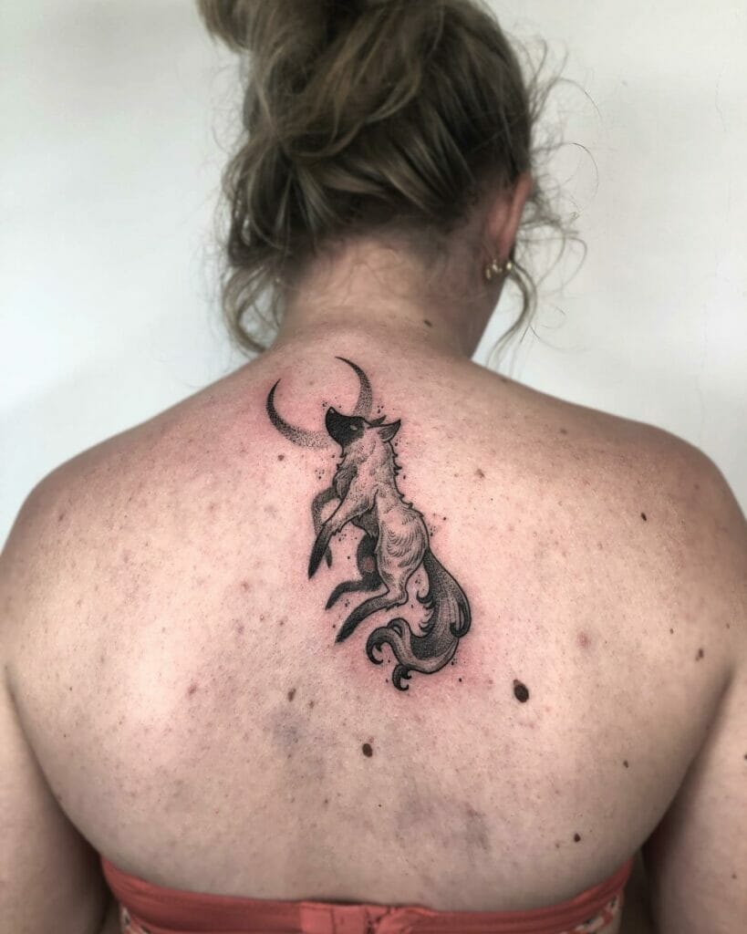 Dark Ink Moon-Themed Wolf Tattoo On Back Design
