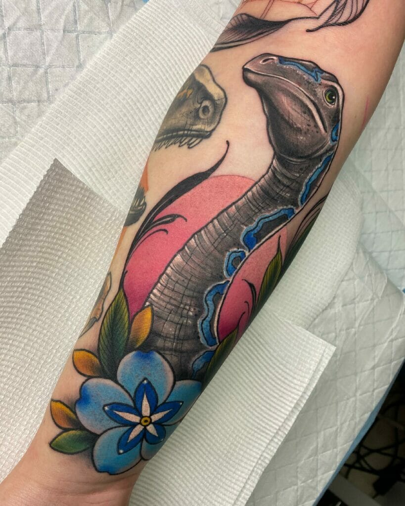 Dinosaur Half Sleeve Tattoo