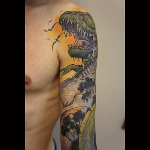 Dinosaur-Themed Sleeve Tattoo