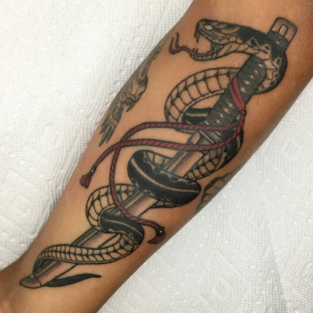 Ferocious Snake And Red Rope Sword Tattoo