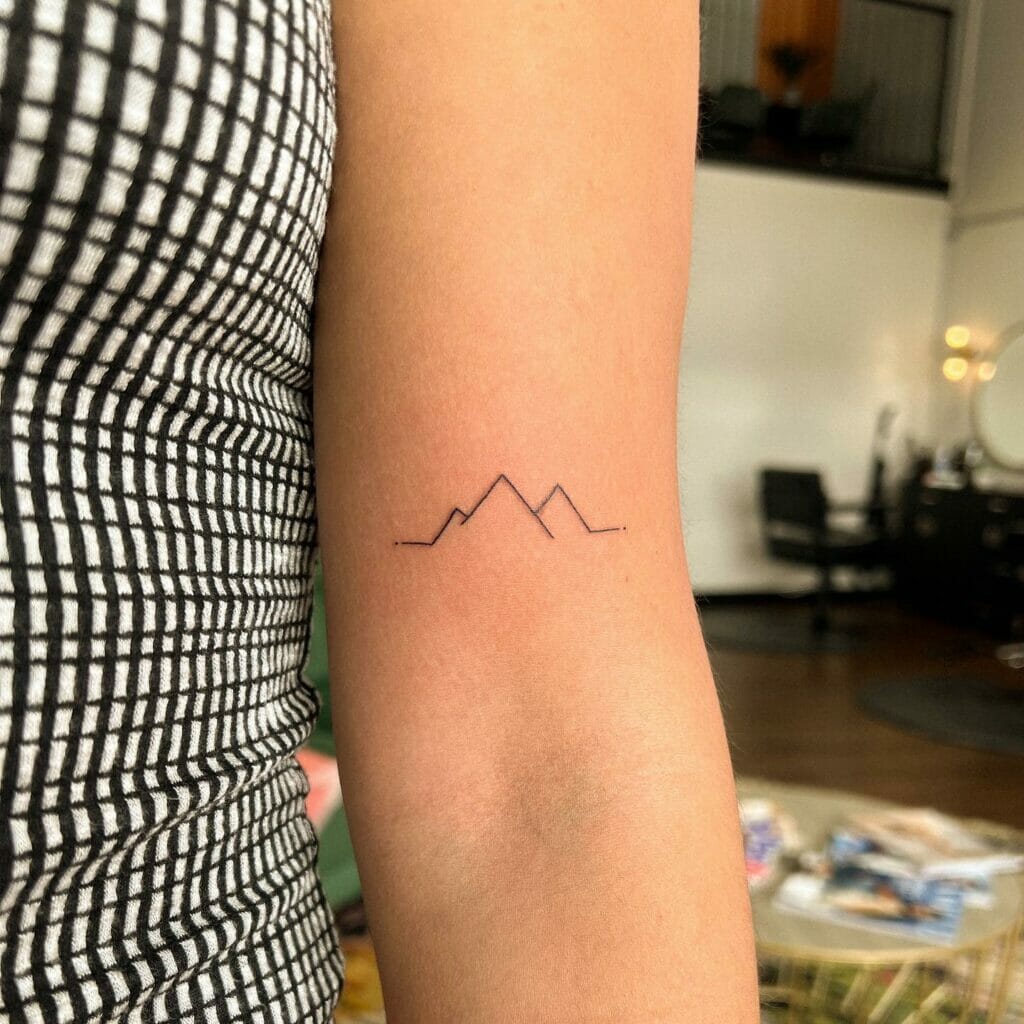 Fine Lines Mountain Tattoo