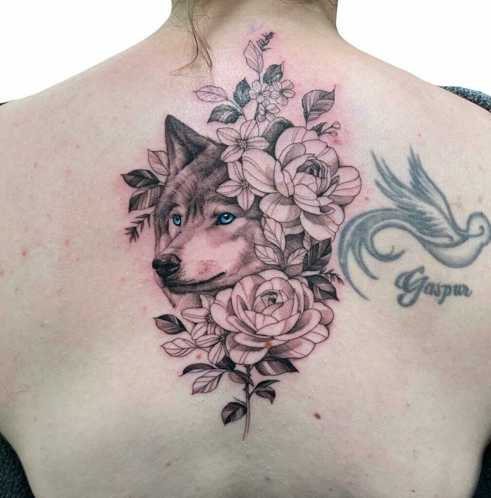 Floral-Themed Cute Wolf Tattoo on Back Design