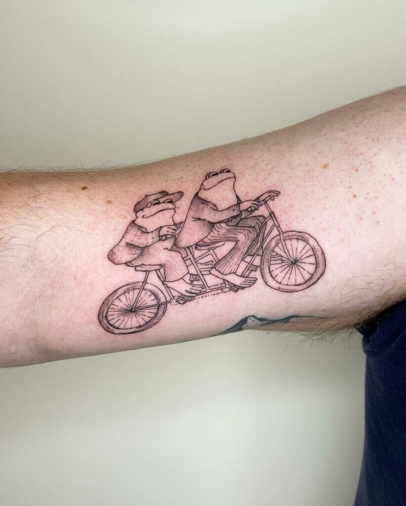 Frog And Toad Riding Bicycle Tattoo