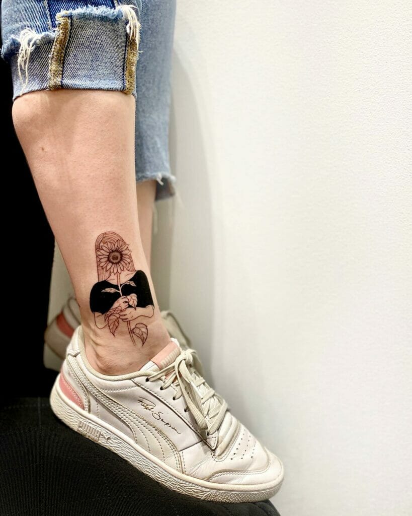 Girl Holding Sunflower Black Ink Tattoo