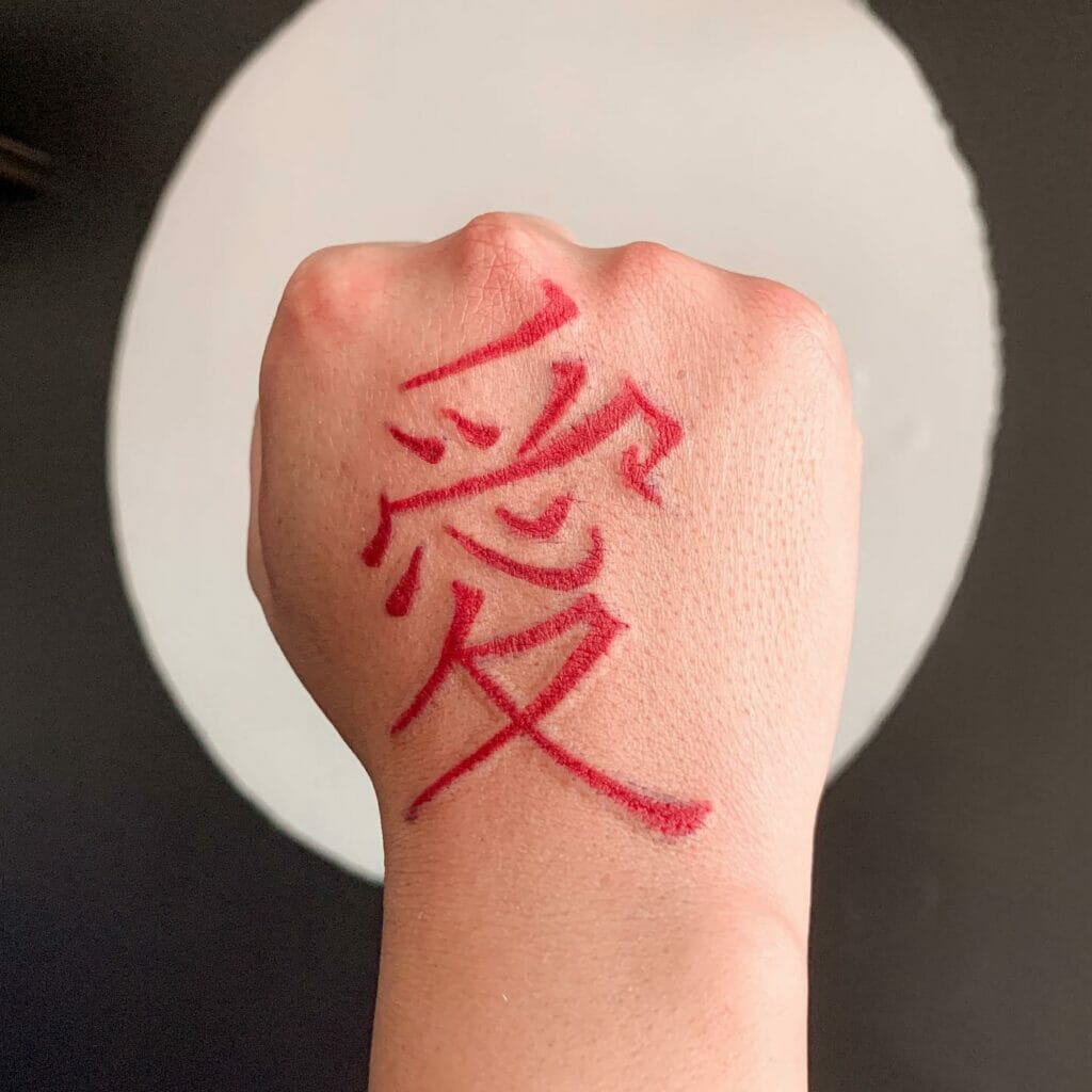 Japanese Love Kanji Tattoo On The Reverse Side Of The Palm