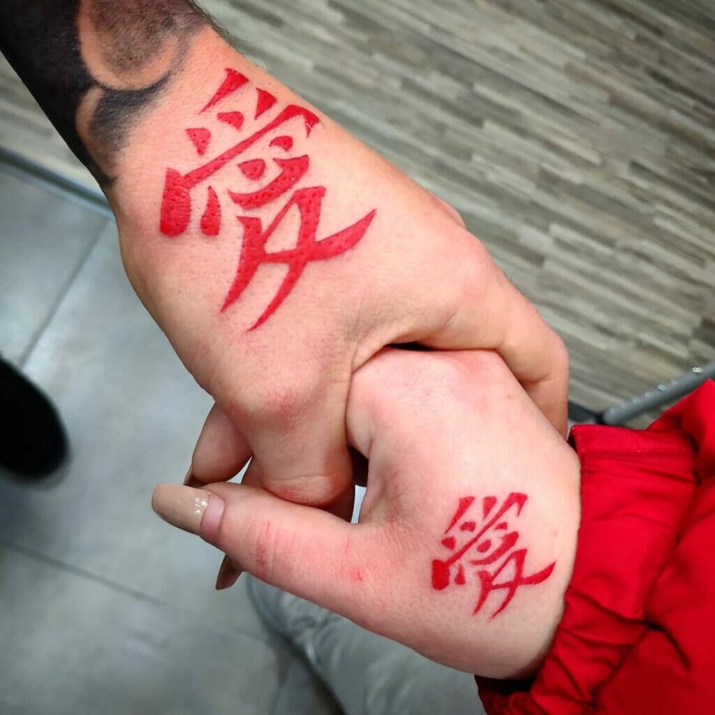 Japanese Love Kanji Tattoo On The Side Of The Palm