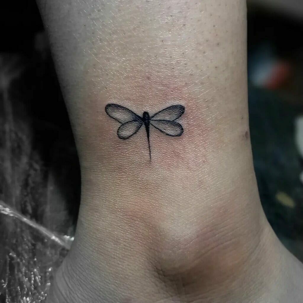 Minimalist Dragonfly Tattoo