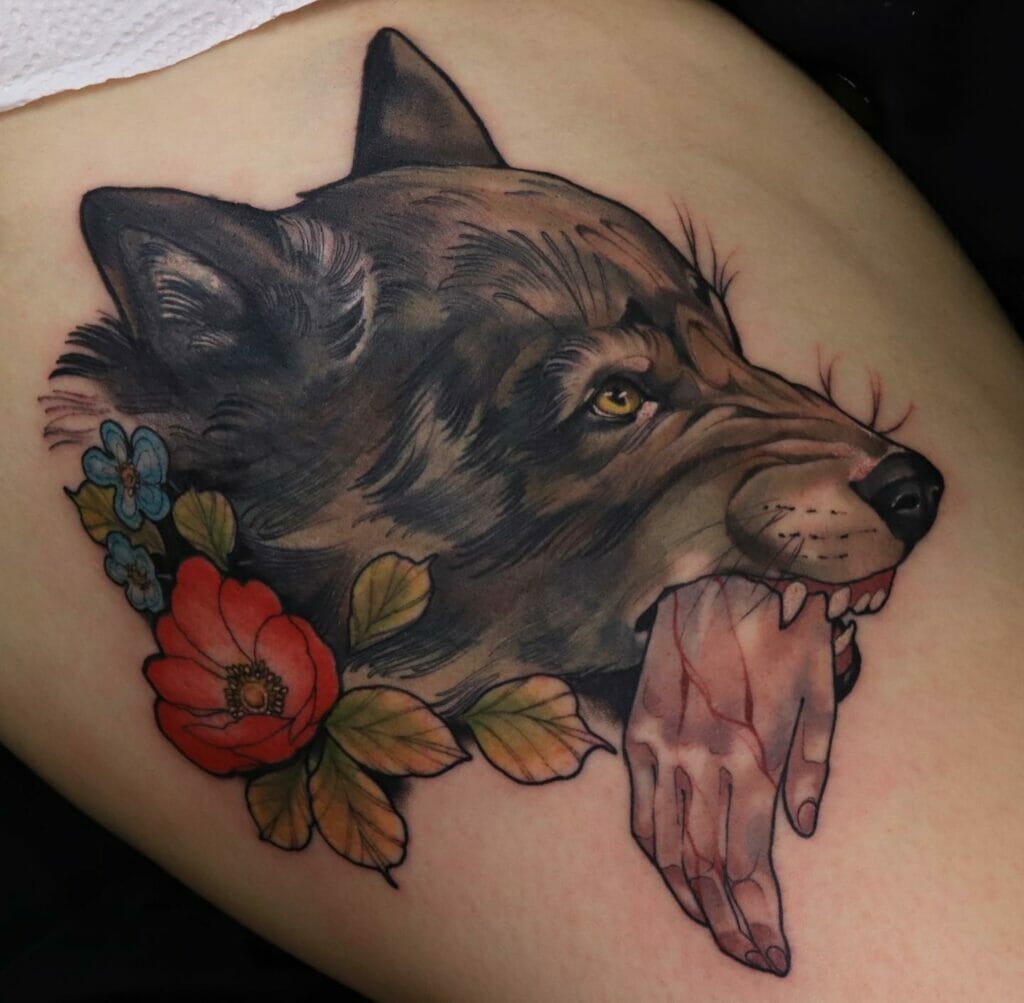 Neo Traditional Wolf Head Tattoo Biting A Hand