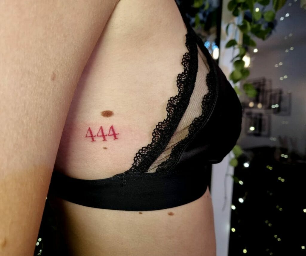 Number 444 Tattoo On Side Boob