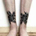 Ornate Black Ink Flower Tattooss