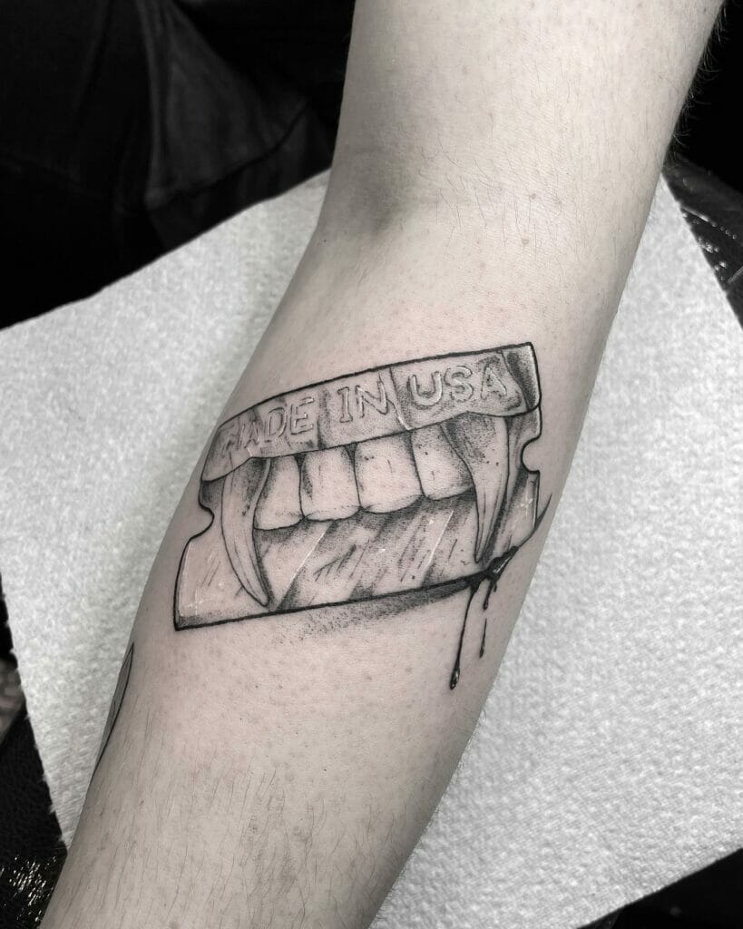 Razorblade Tattoo With Teeth