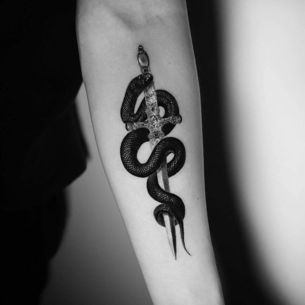 Small Detailed Sword With Snake Wrapped Around It Tattoo