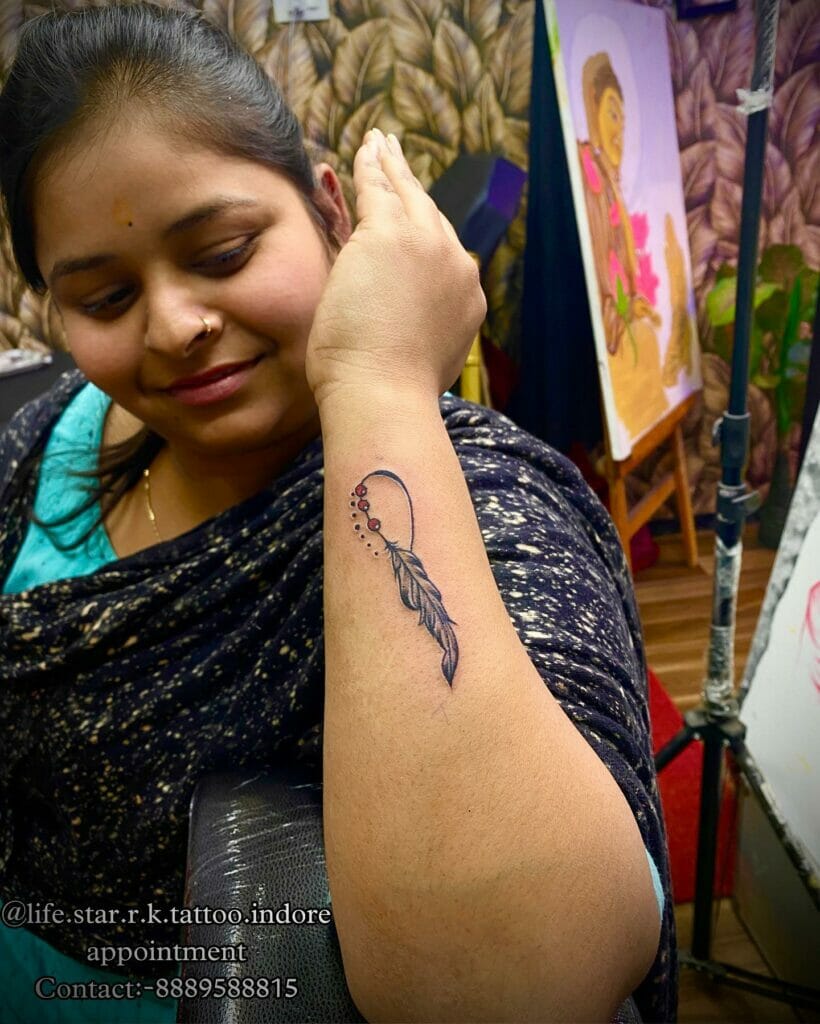 The Simple Infinity Feather Tattoo