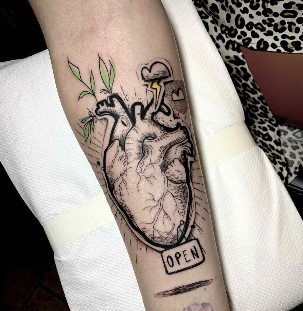 The Unique Heart Tattoo Design Of The New Budding Plant