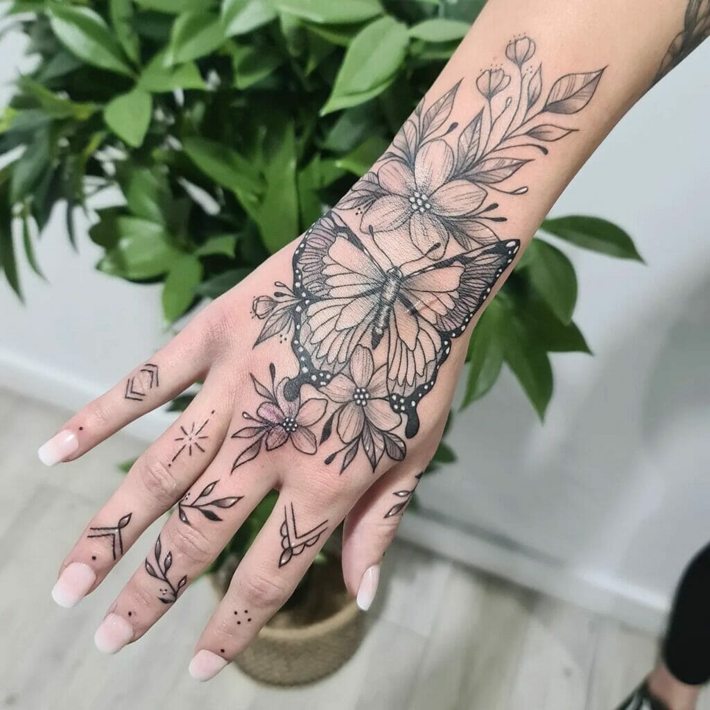 Traditional Butterfly With Flowers Tattoo