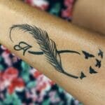 Women's Infinity Feather Tattoo Ideas