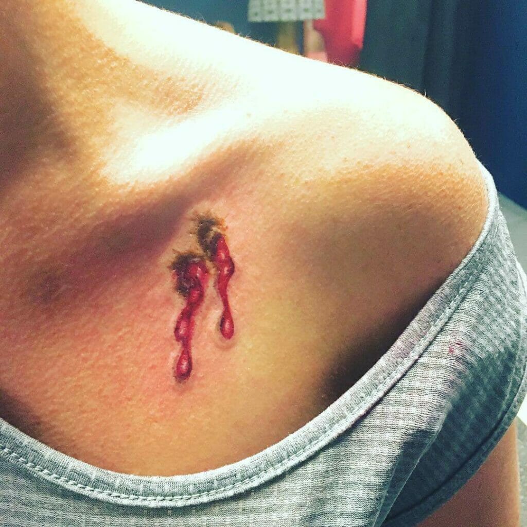 Mythical Collarbone Vampire Bite Tattoo