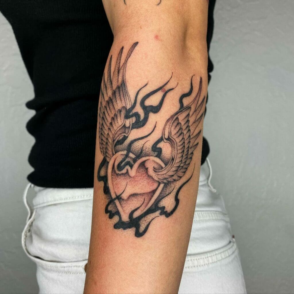 Chrome Heart Tattoo With Wings
