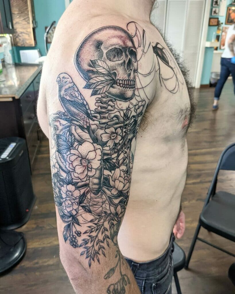 Wicked Skull And Flower Art Tattoo
