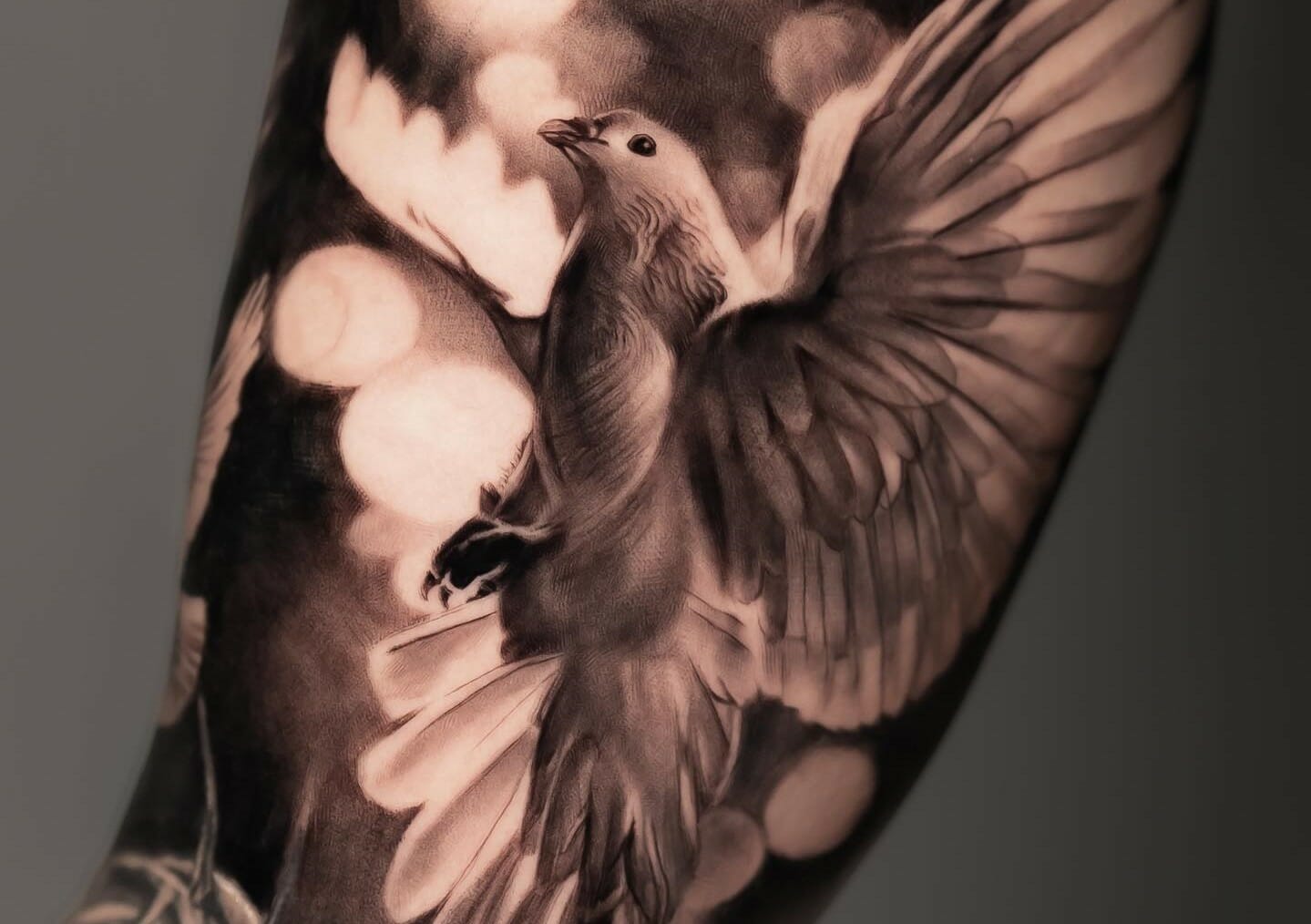 flying dove tattoo