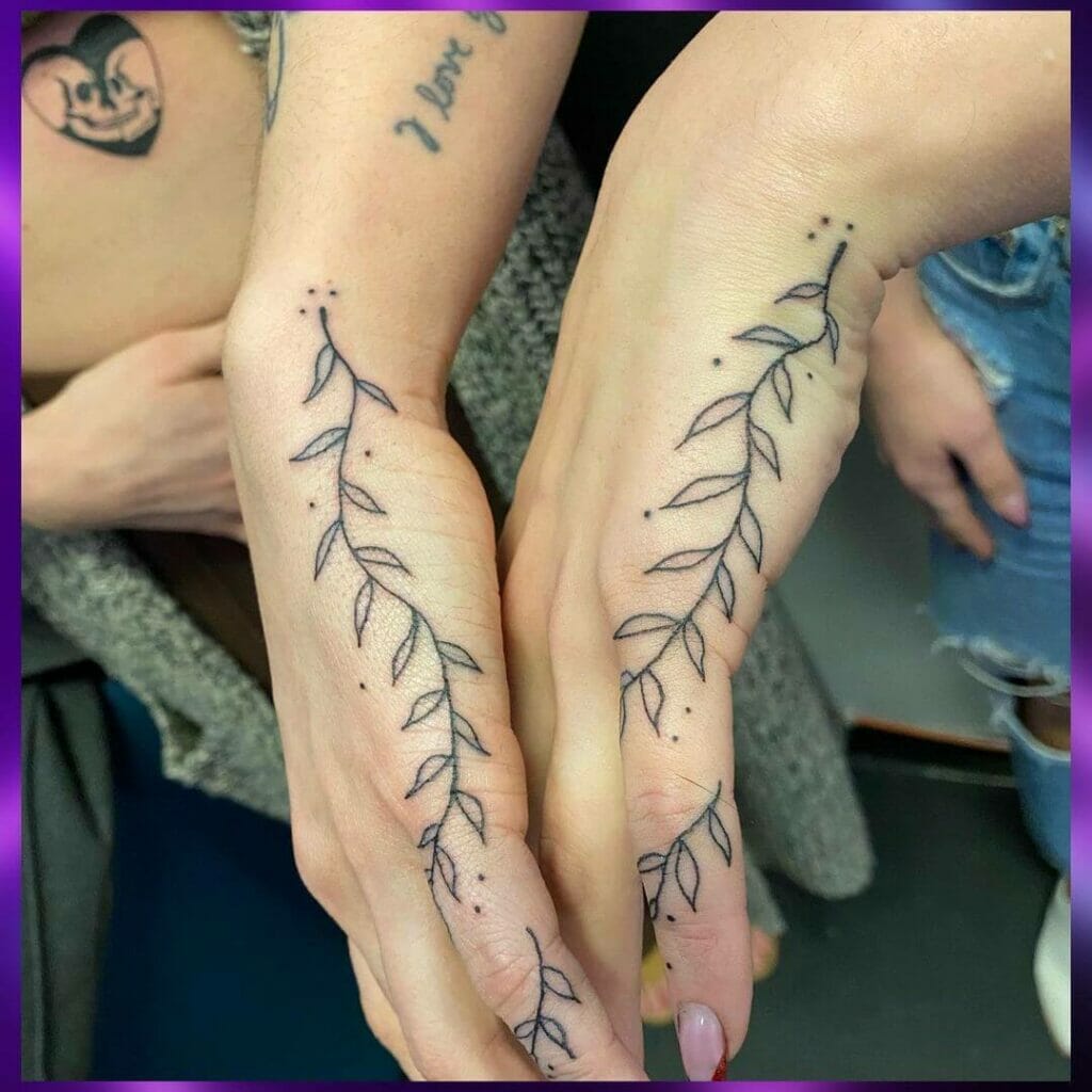 Sleek Vine Finger Tattoo On Side Palm