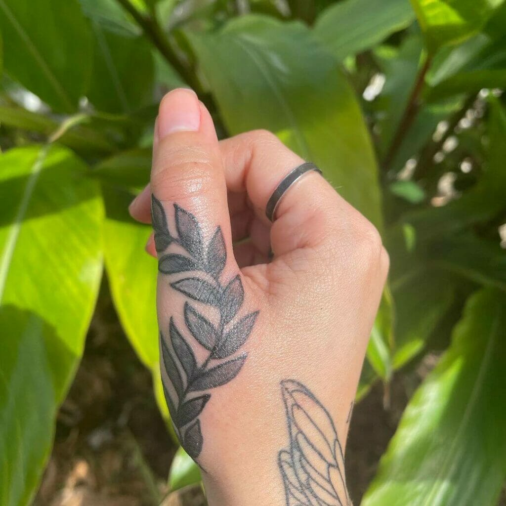 Solo Vine Finger Tattoo On Thumb