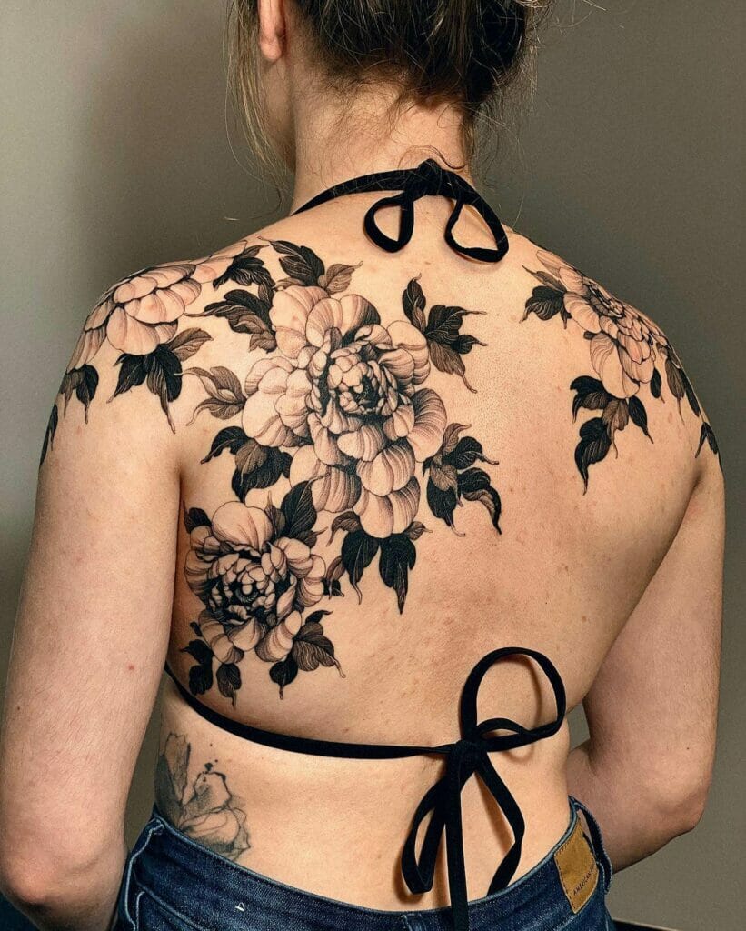Amazing Black Ink Shoulder Blade Floral Tattoo Ideas