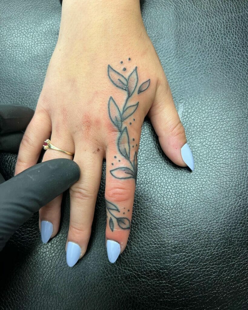 Line Vine Finger Tattoo