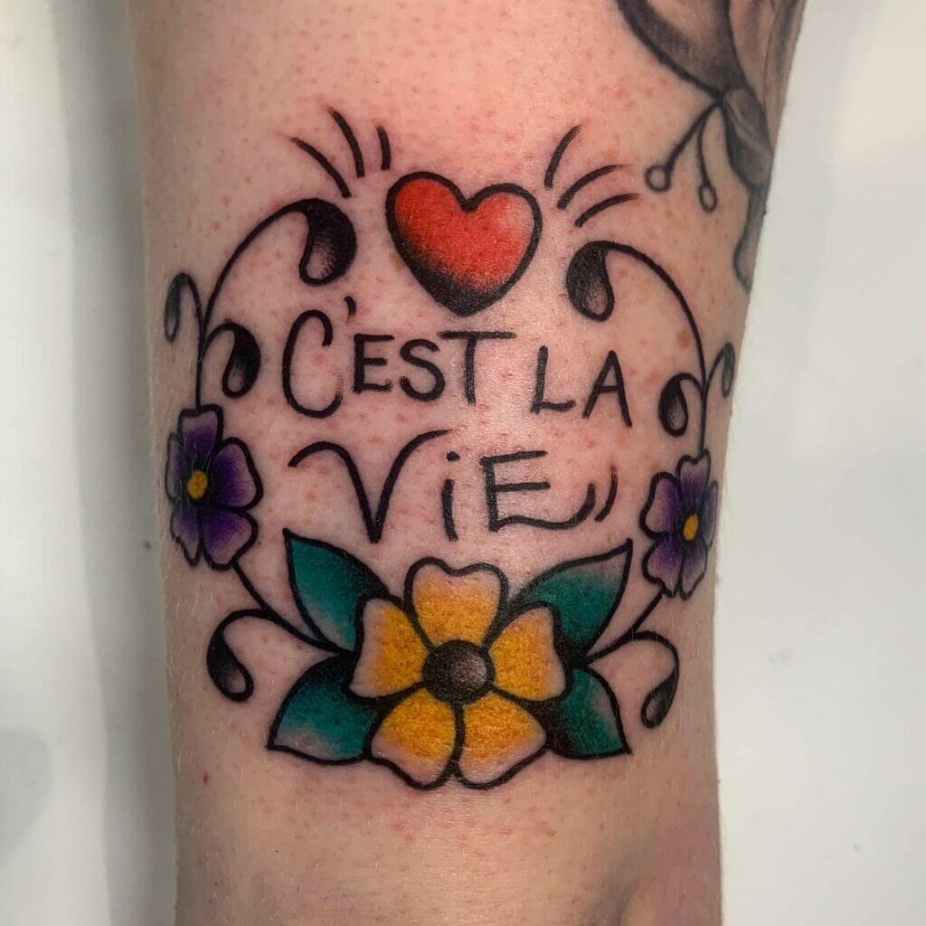 C'est La Vie Tattoo With Flowers And Heart Design