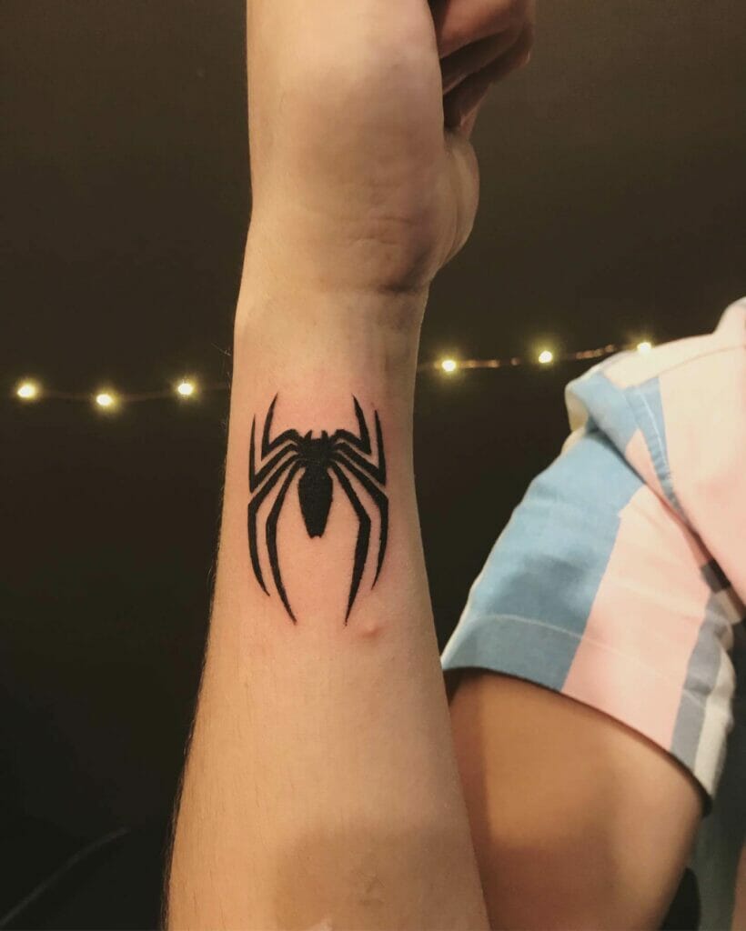 Small Black Spiderman Logo Tattoo