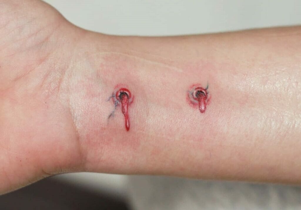 Vampire Bite Tattoo