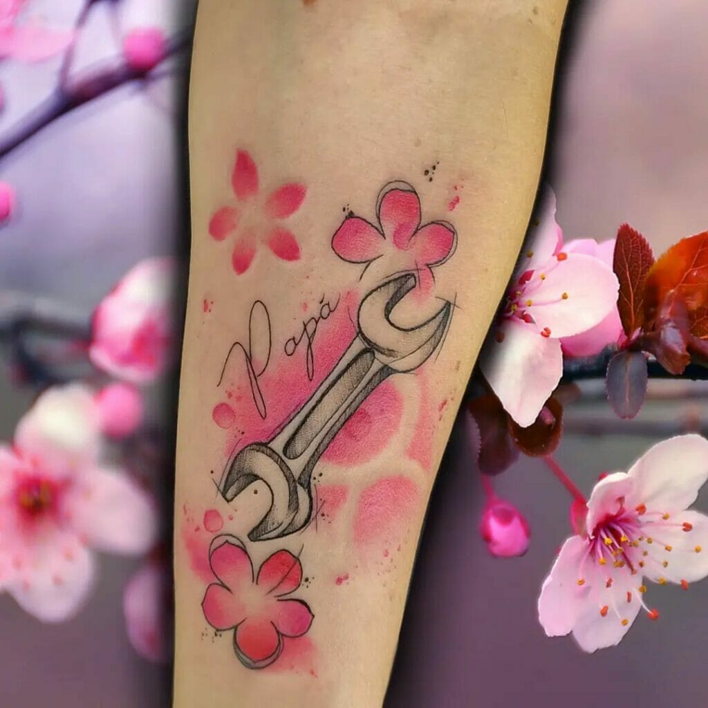 Pink Flower Tattoo On The Forearm