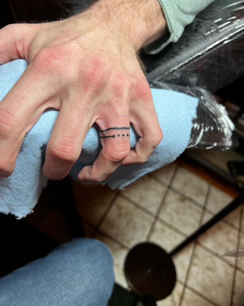 Ring Finger Tattoo