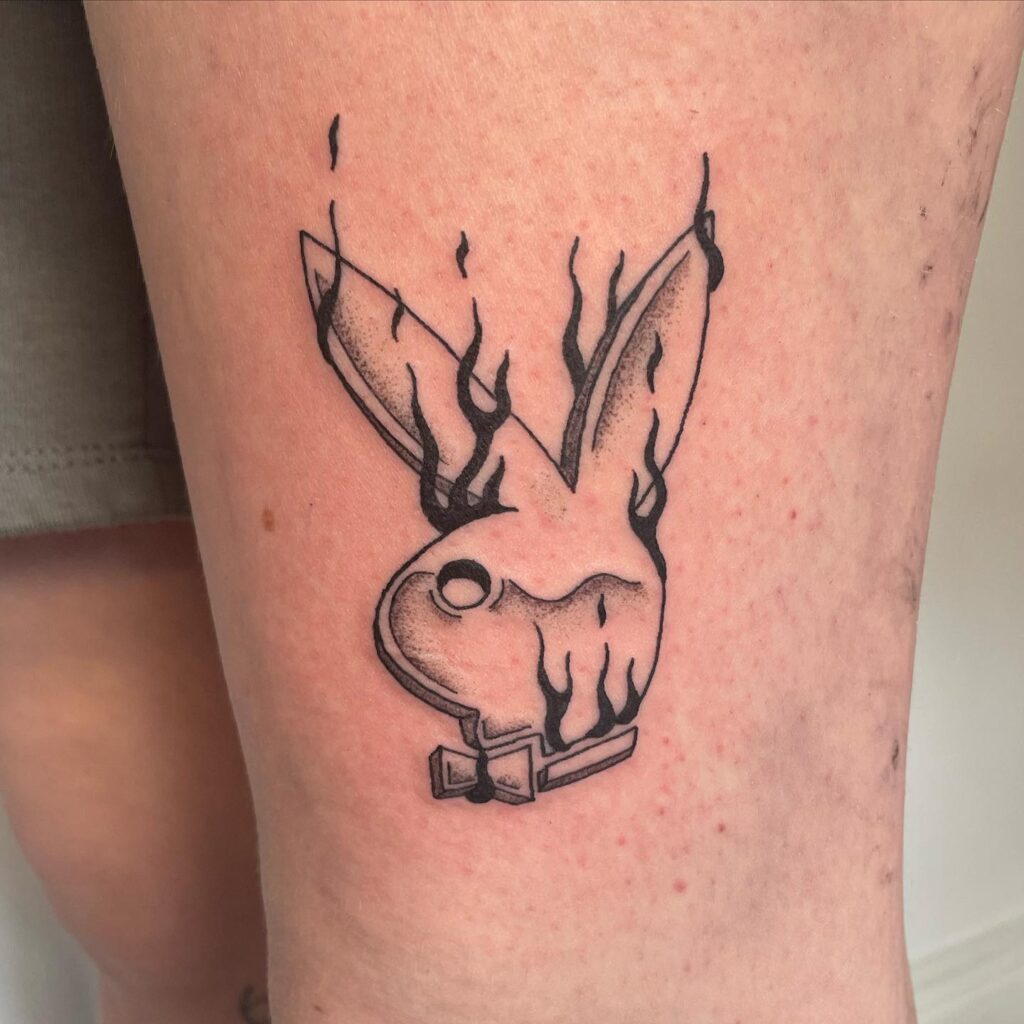 Luis Vuitton playboy bunny tattoo with initials H.C.M. 🐰