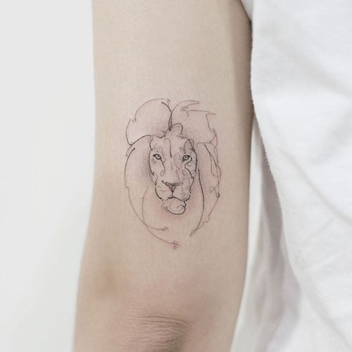 Small lion tattoo